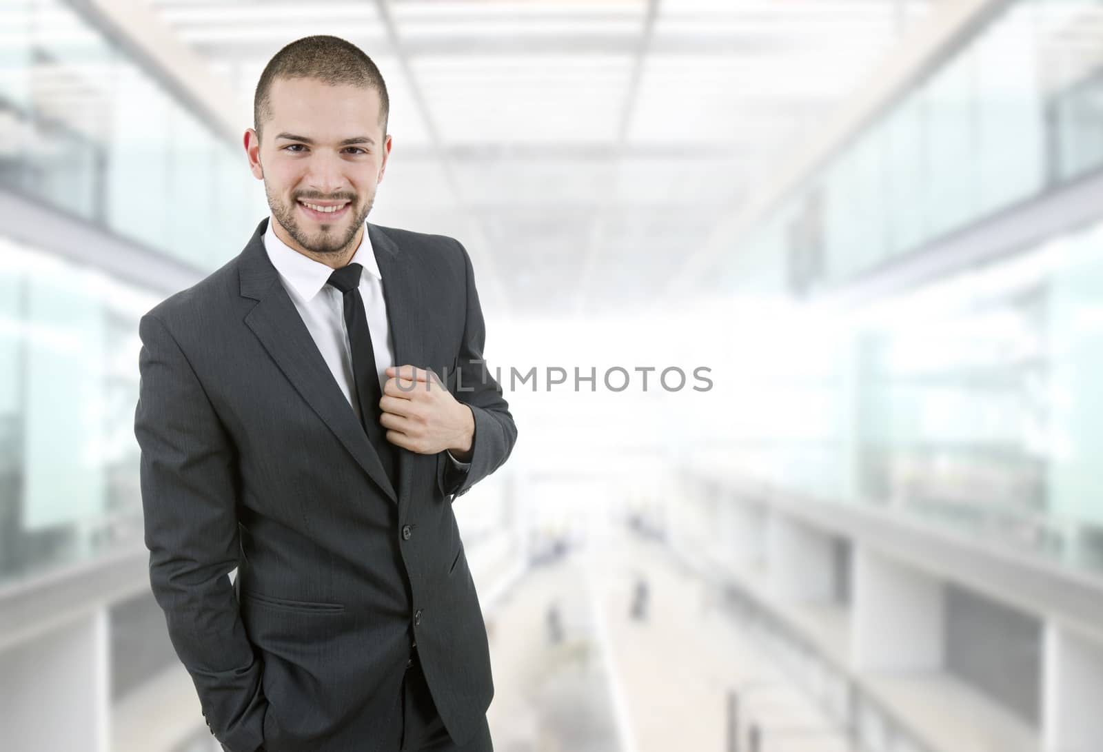 happy young businessman portrait at the office