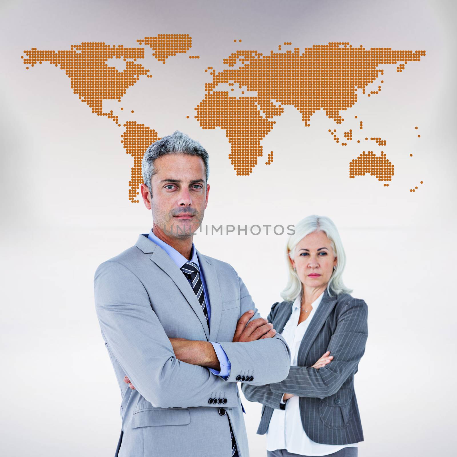  Smiling businesswoman and man with arms crossed against orange world map on white background