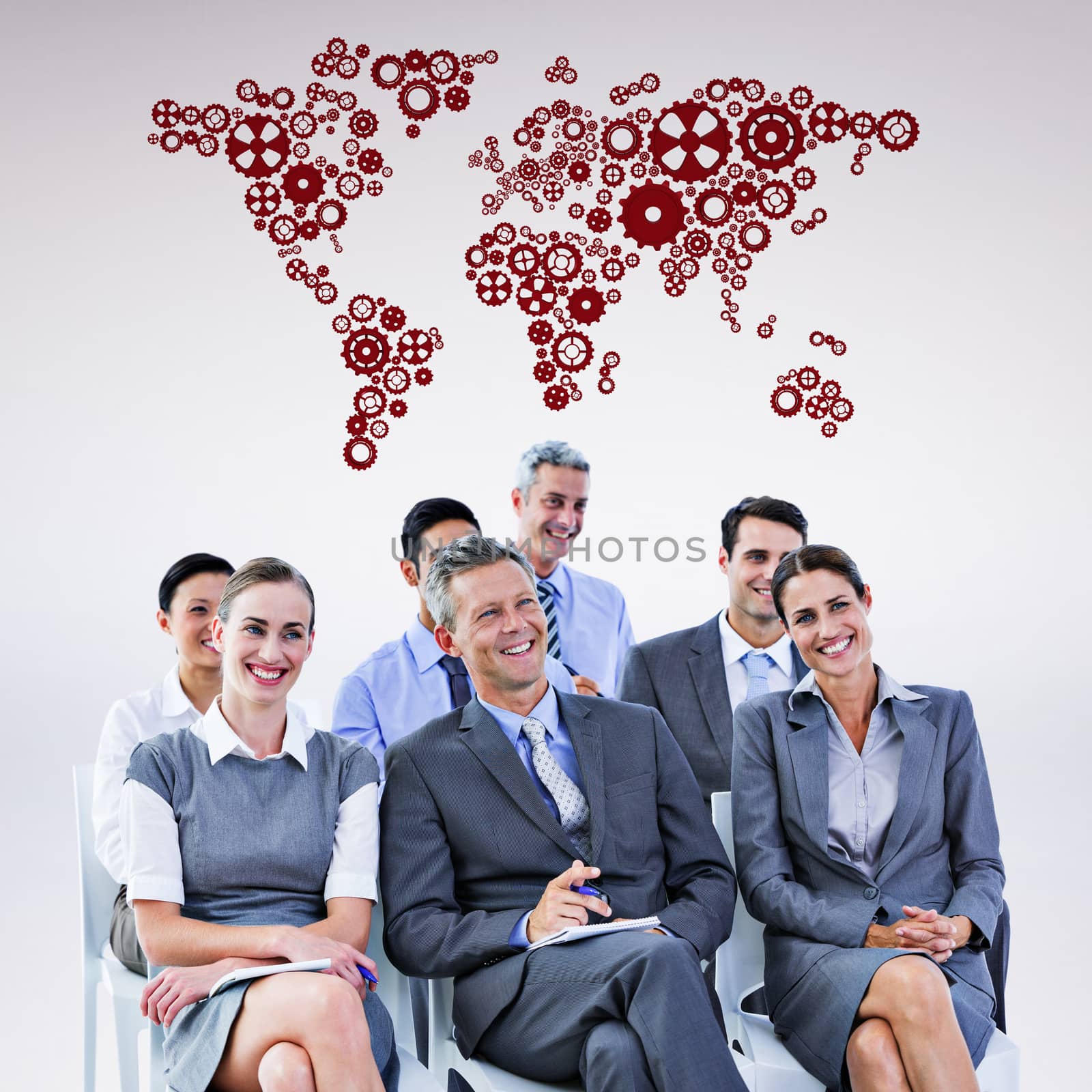 business team during a meeting against grey background