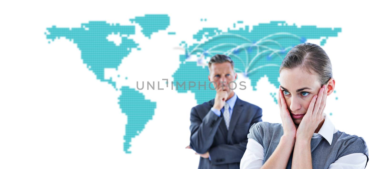 Business team thinking against world map 