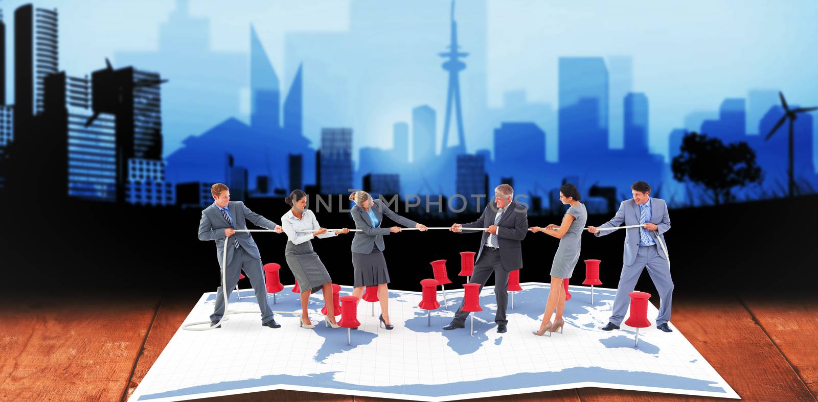 Business team pulling the rope  against cityscape stencil design