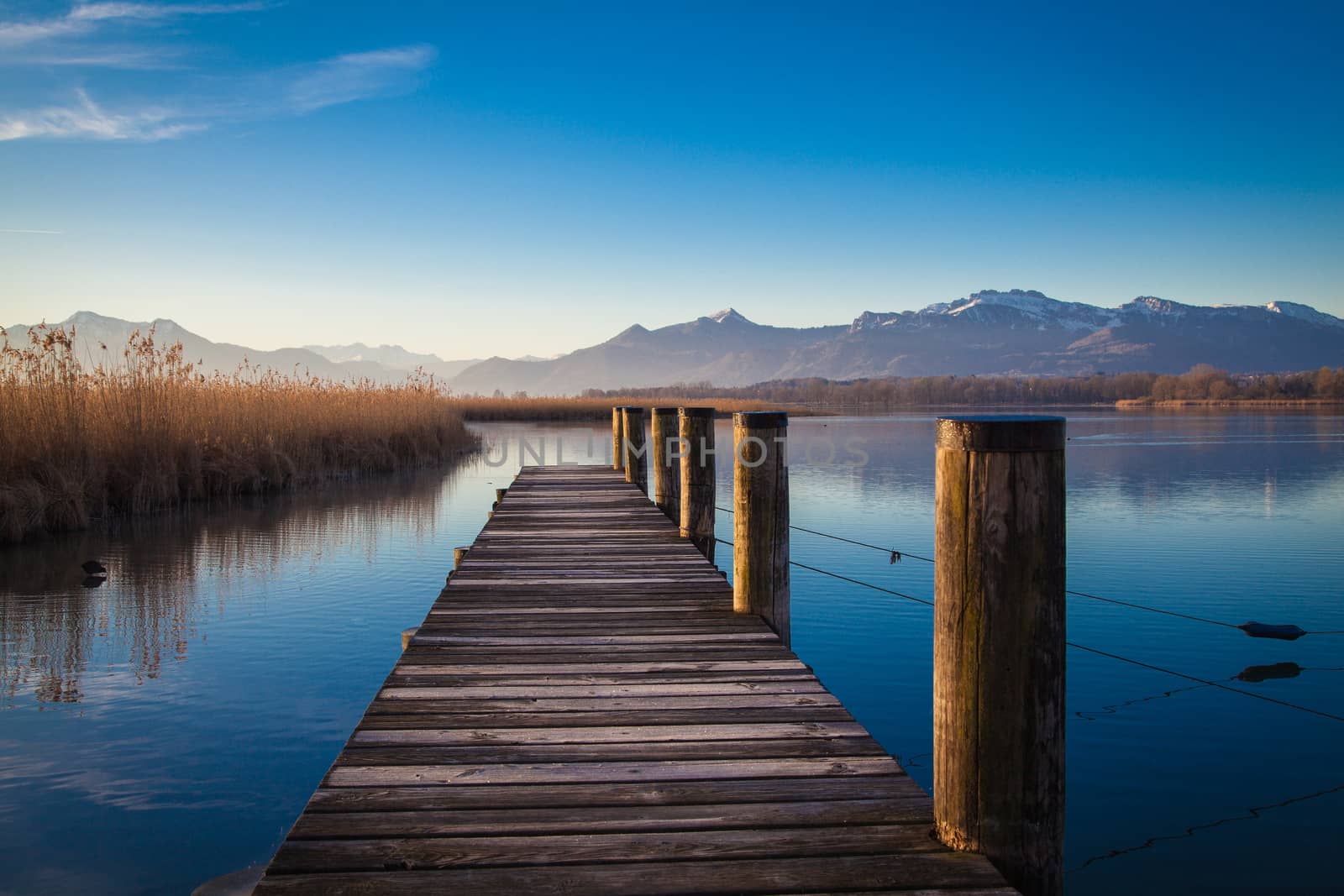 Early morning at a jetty at lake Chiemsee