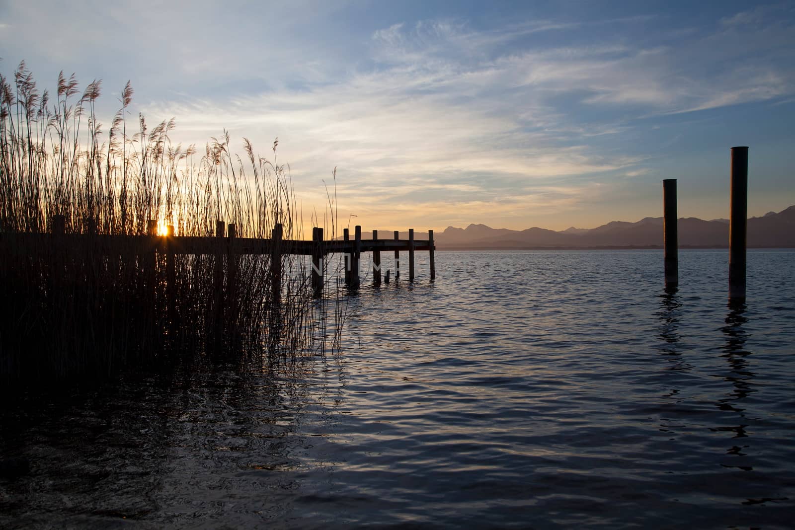 Early morning at a jetty at lake Chiemsee