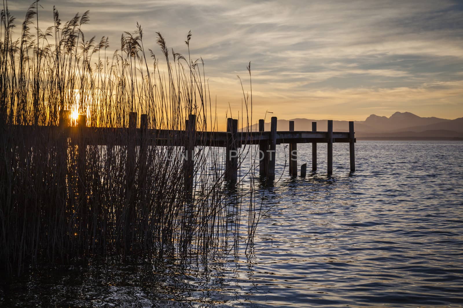 Early morning at a jetty at lake Chiemsee