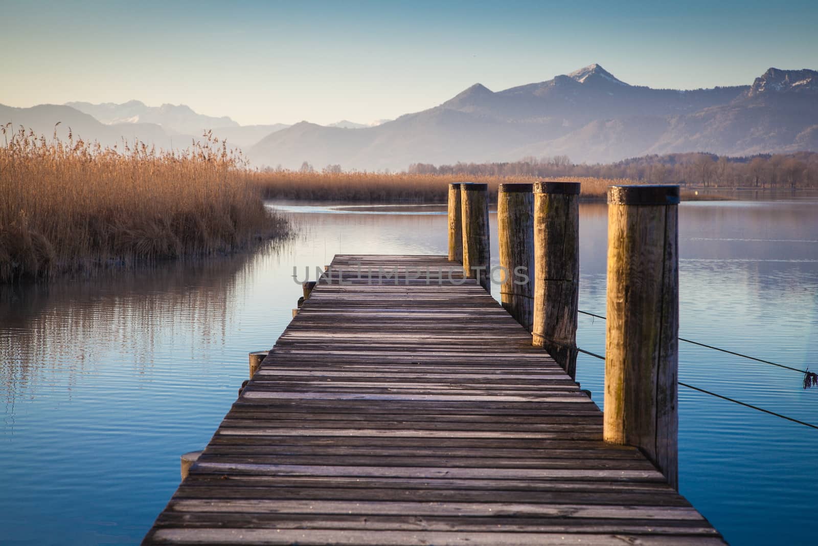 Early morning at a jetty at lake Chiemsee