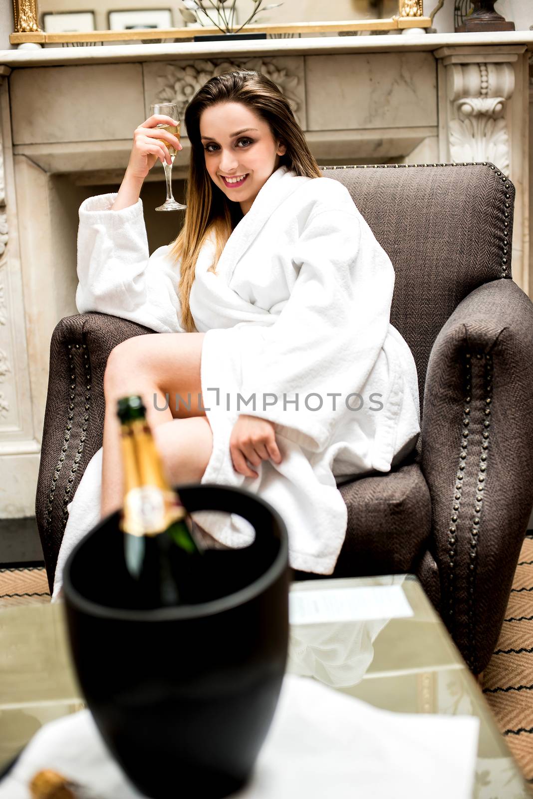 Pretty woman posing with glass of drink
