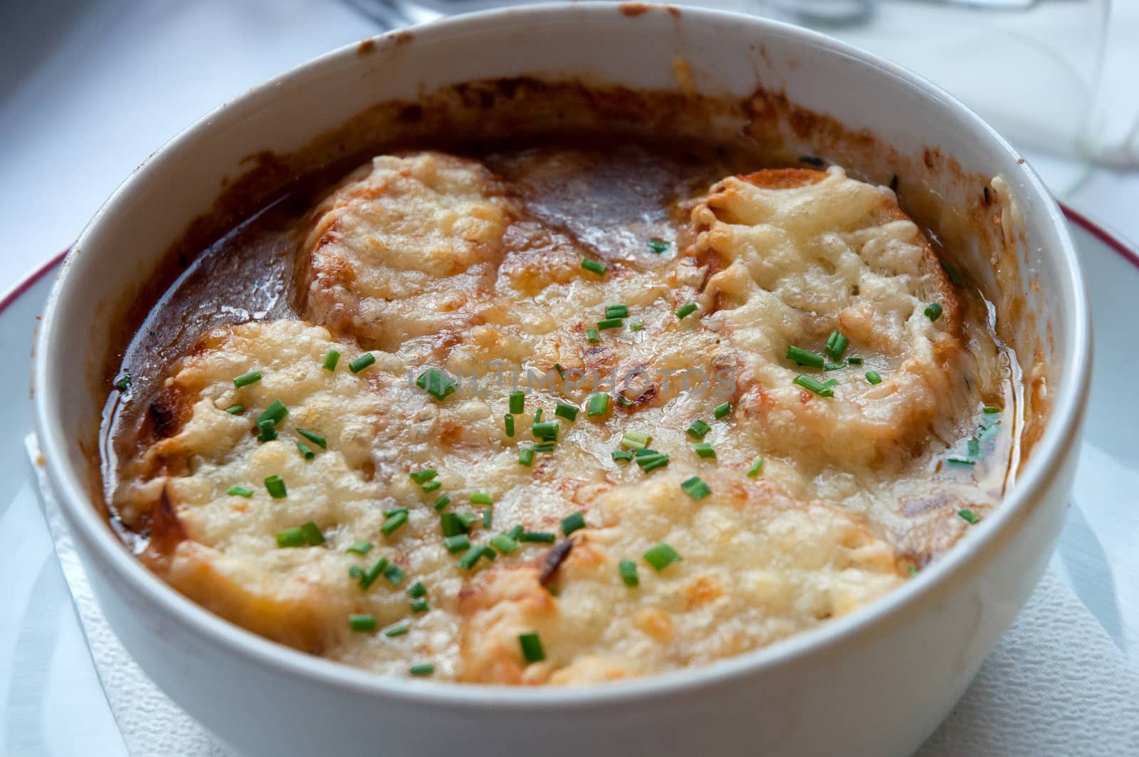 French onion soup with cheese . by LarisaP