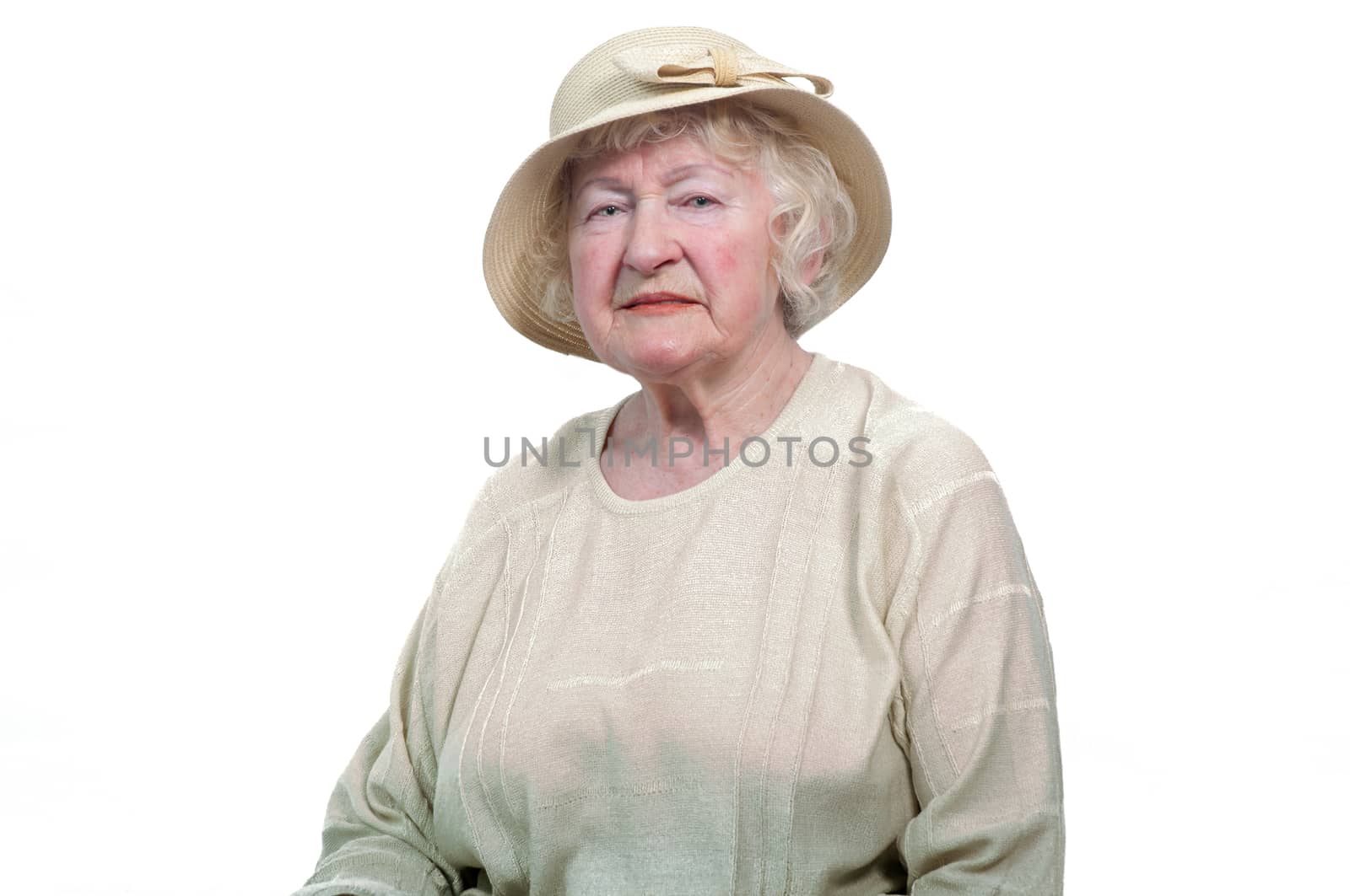 Portrait of  80 years old cheerful woman  on a white background.