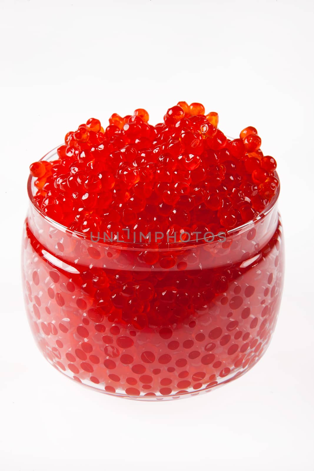 Red caviar on an isolated studio background