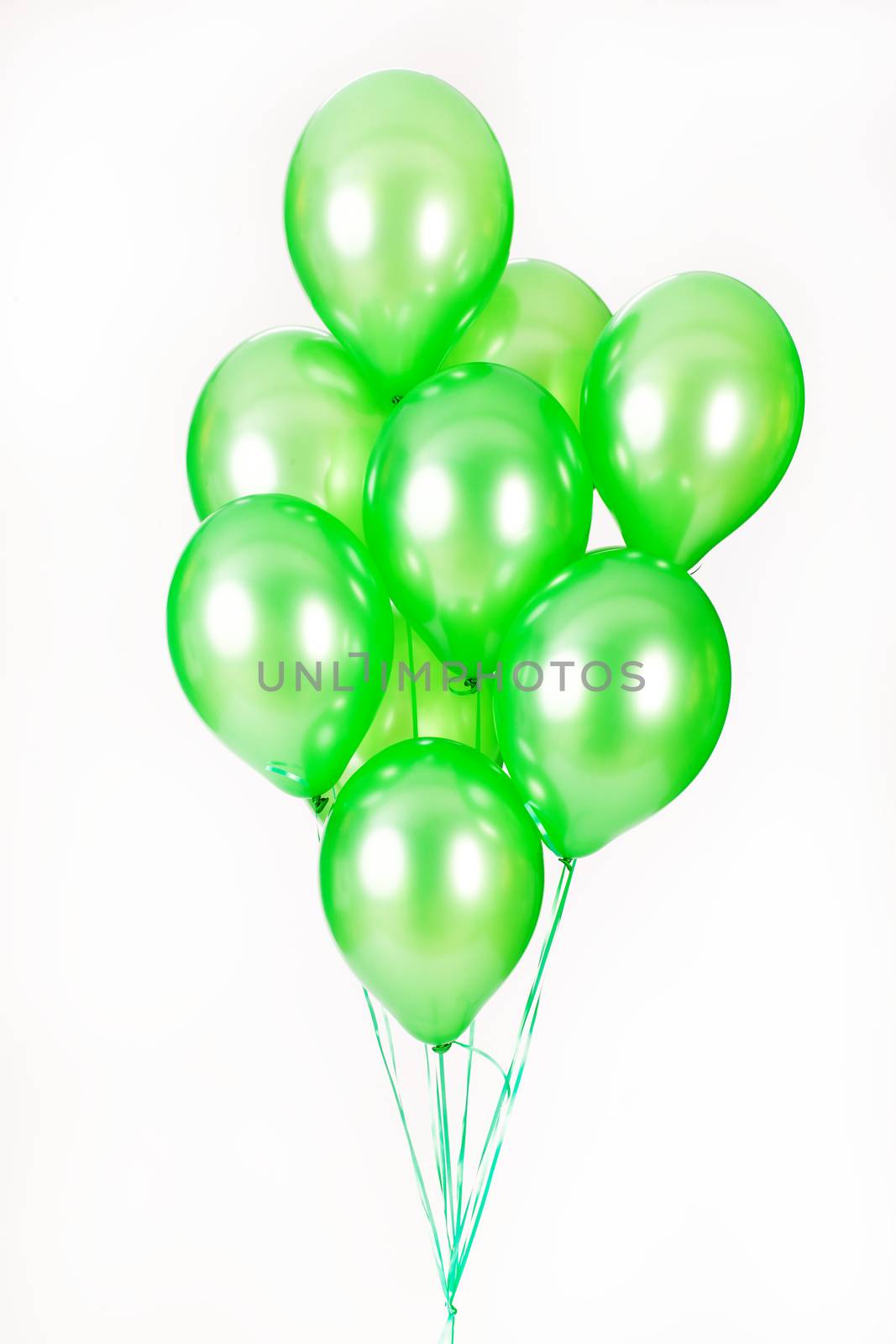 Multicoloured air balloons on isolated studio background