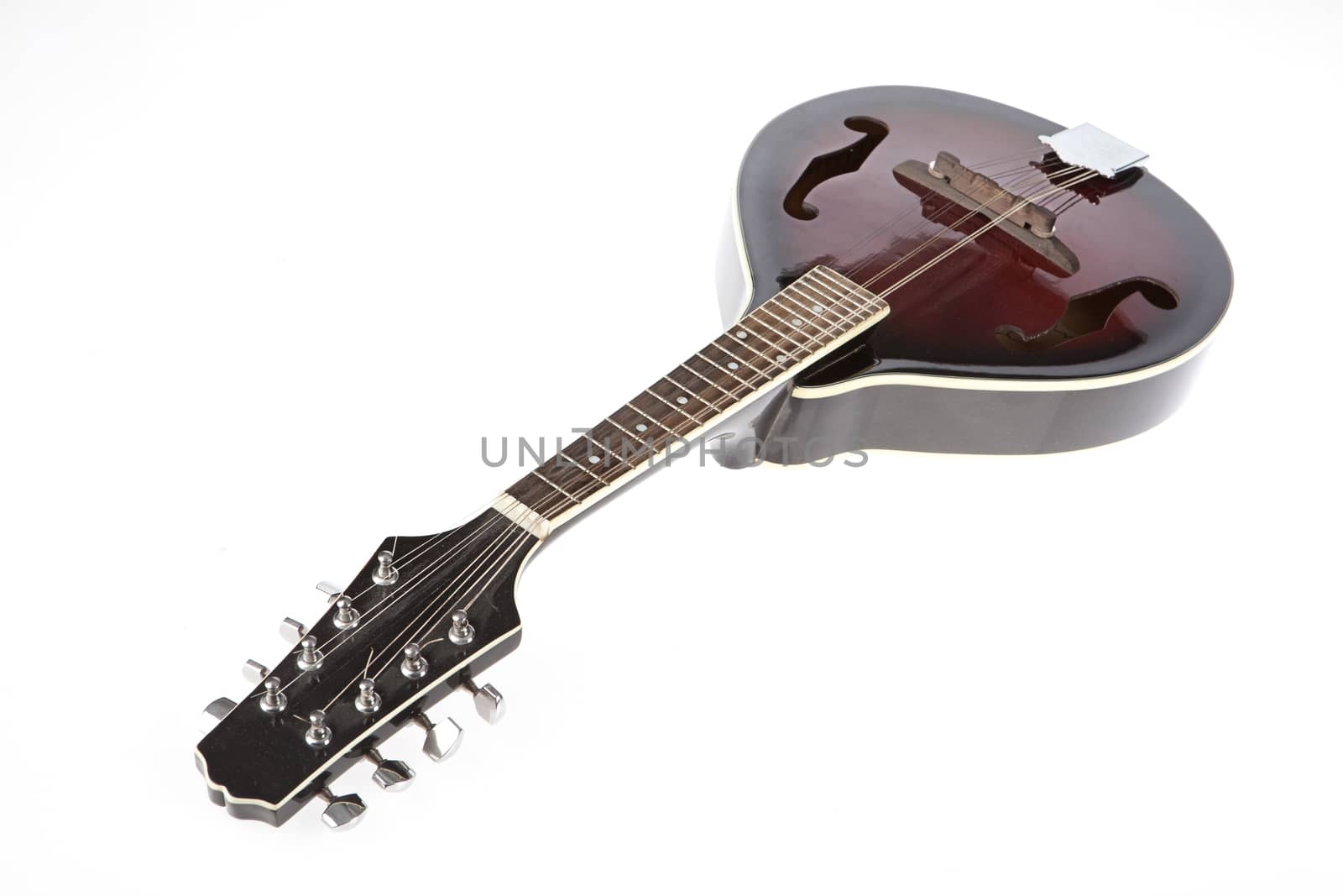 Old mandoline on an isolated studio background