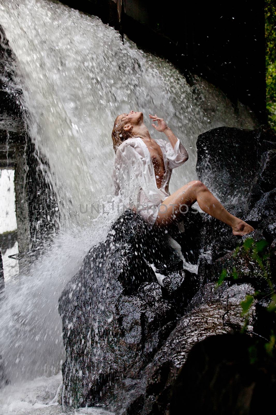 Young Woman Near The Waterfall by Fotoskat