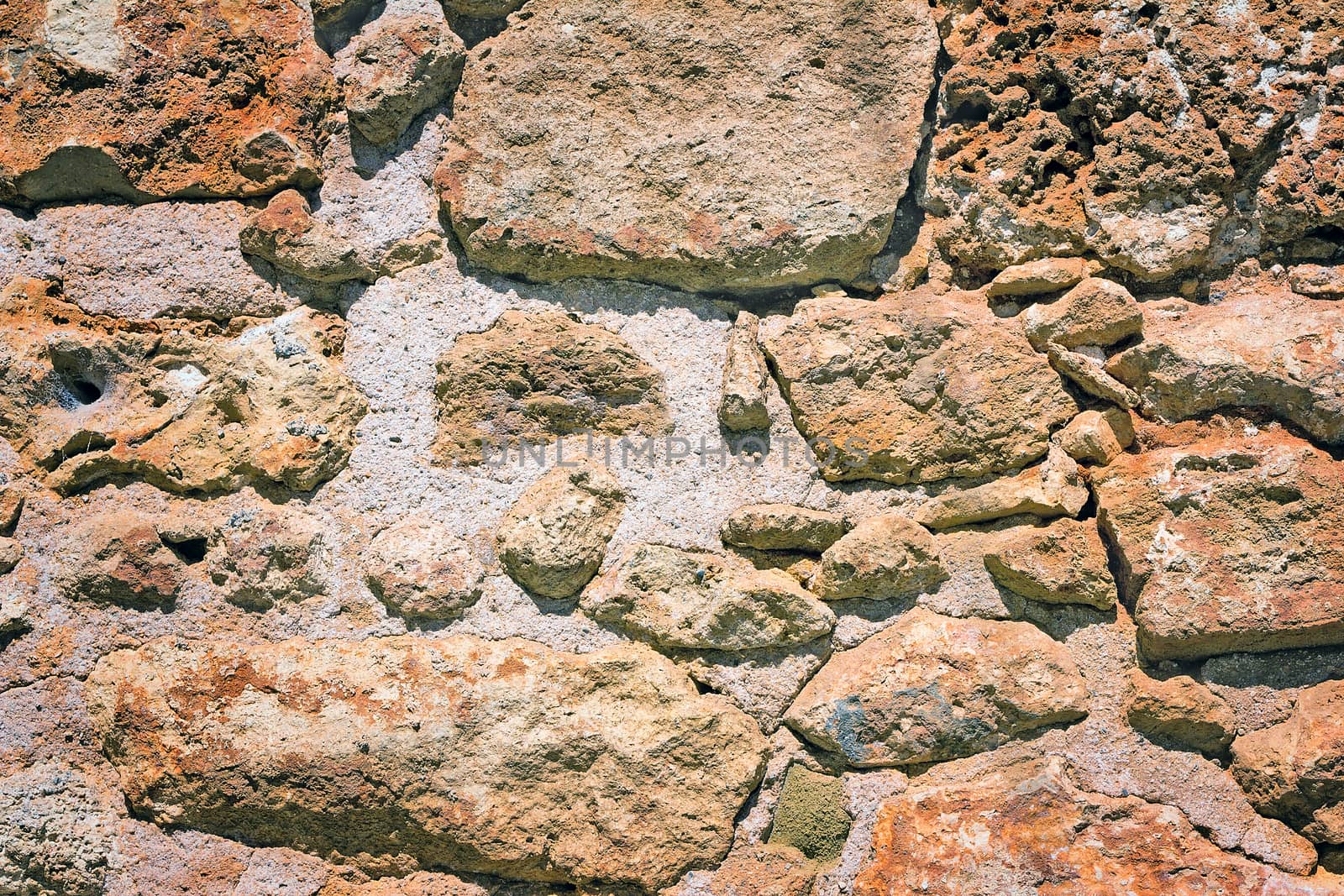 Fragment of an ancient wall from stones. (Background image) by georgina198