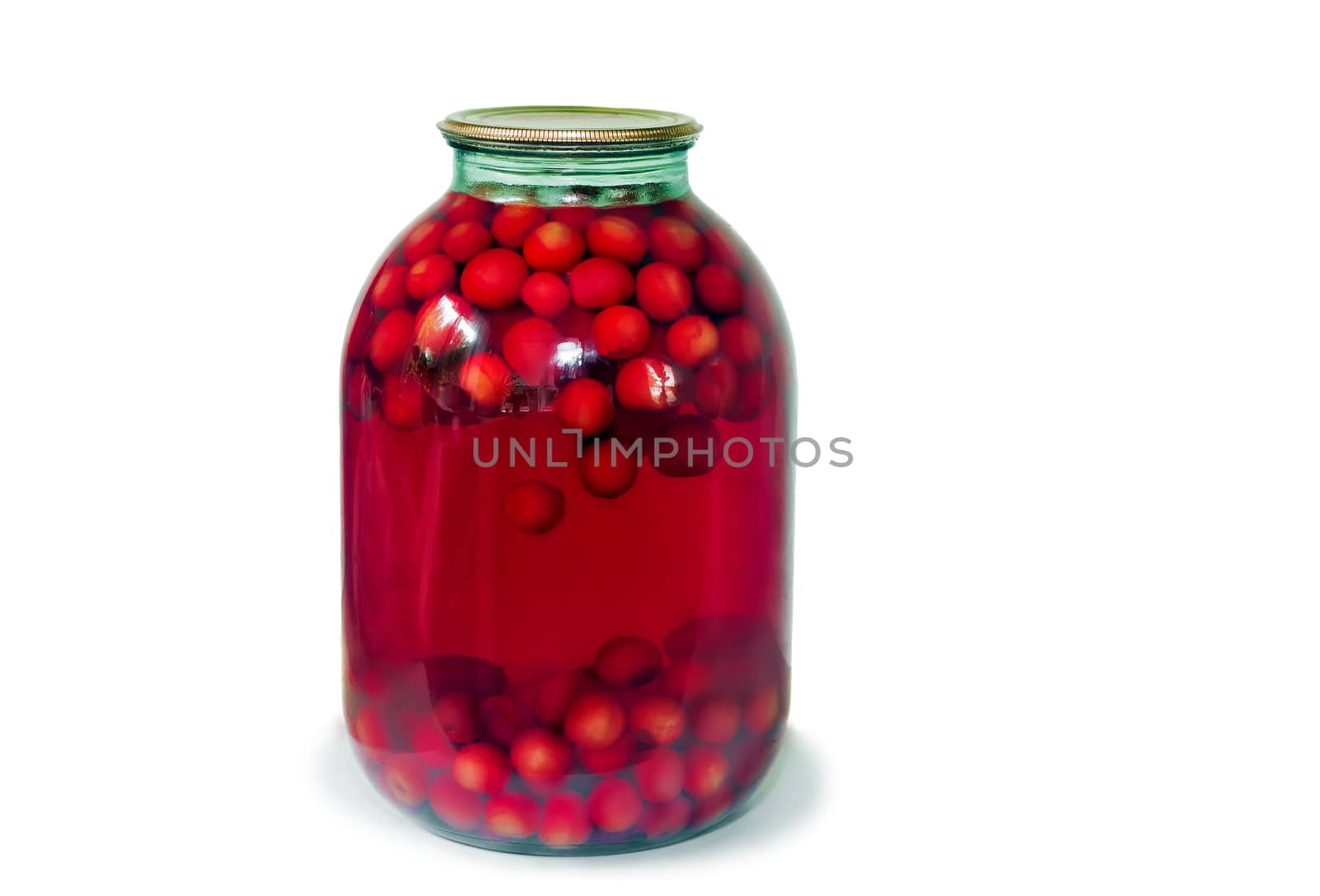 Home canning: glass cylinders with cherry compote on white backg by georgina198