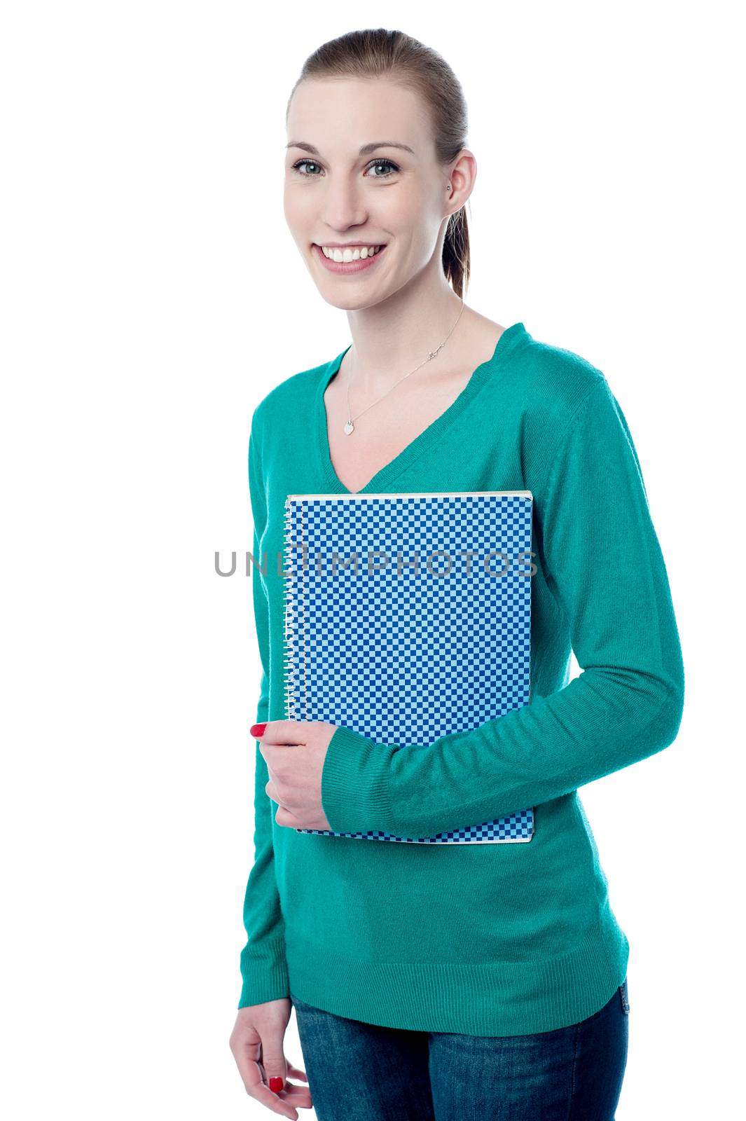 Young college student posing with notebook
