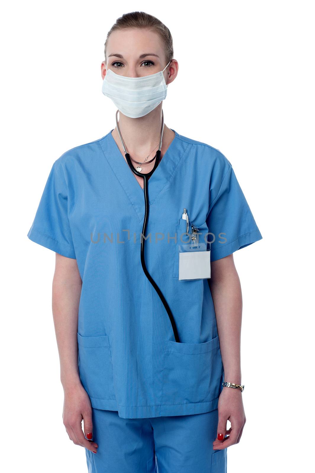 Female surgeon posing with face mask