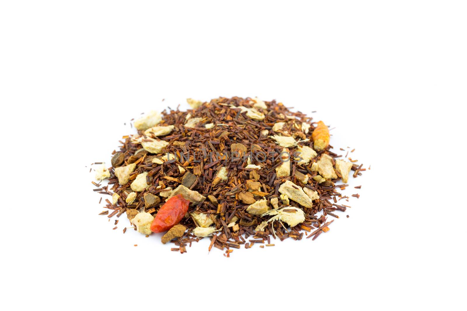 Heap of loose red bush hot spicy winter tea isolated on white background