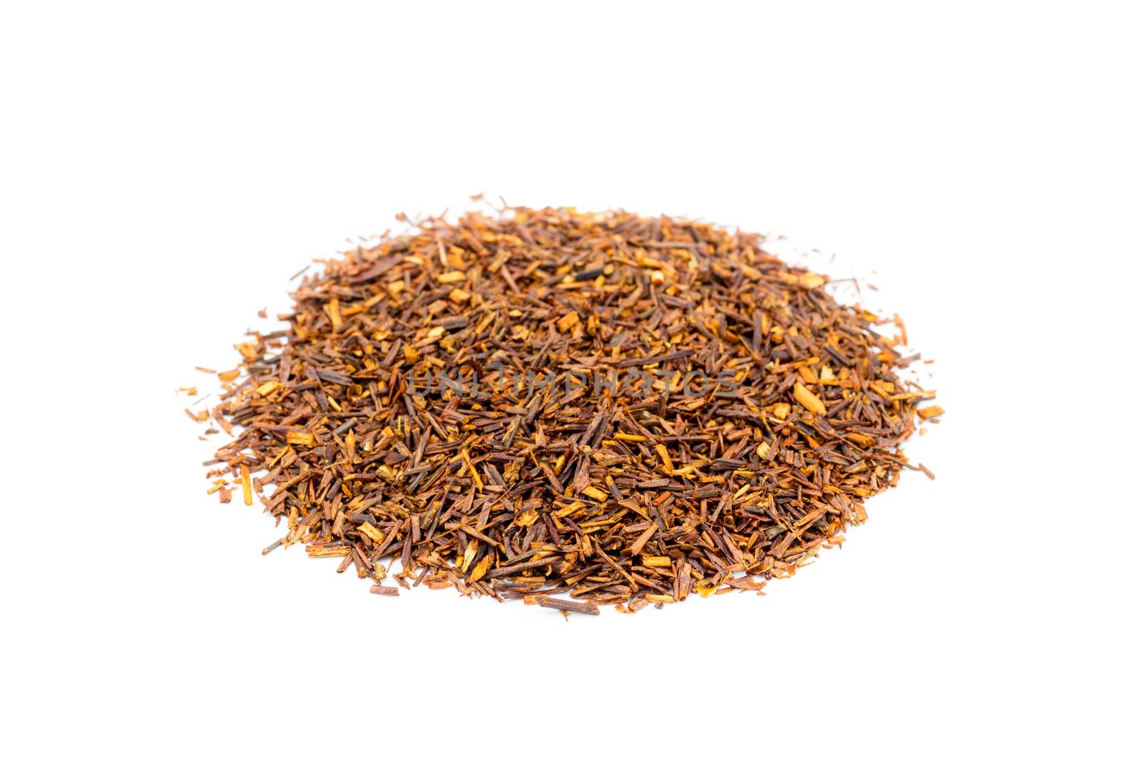 Pile of loose South African red tea or bush tea isolated on white background