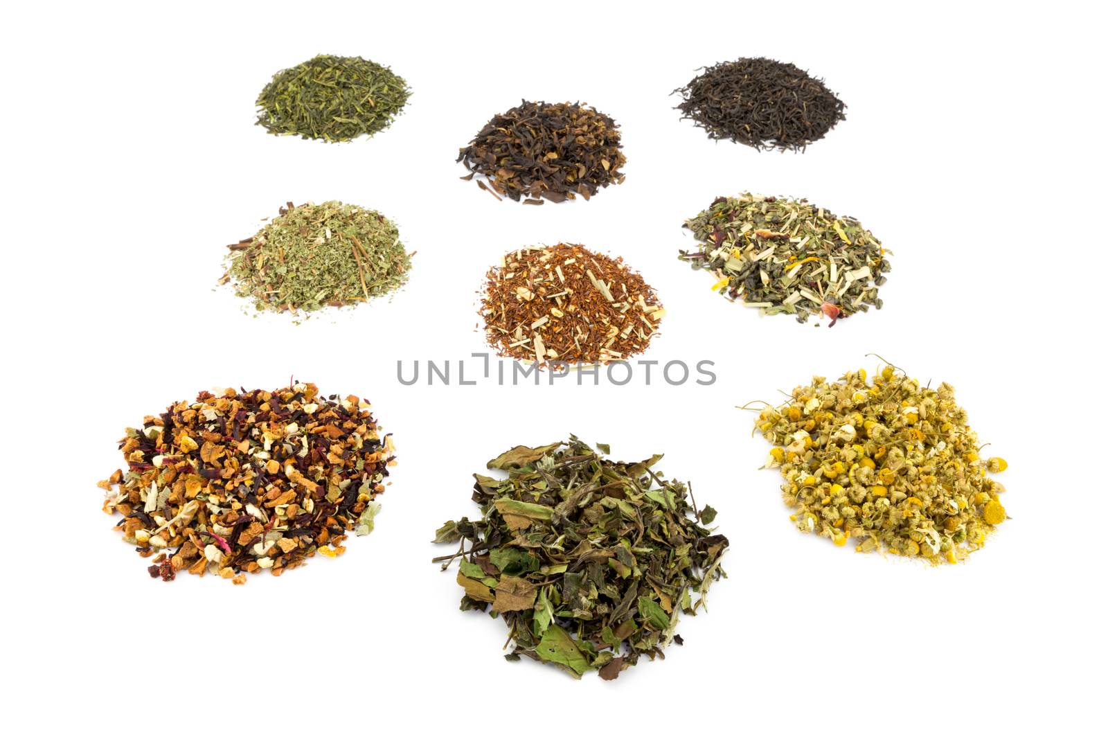 Various heaps and tastes of tea isolated on white background