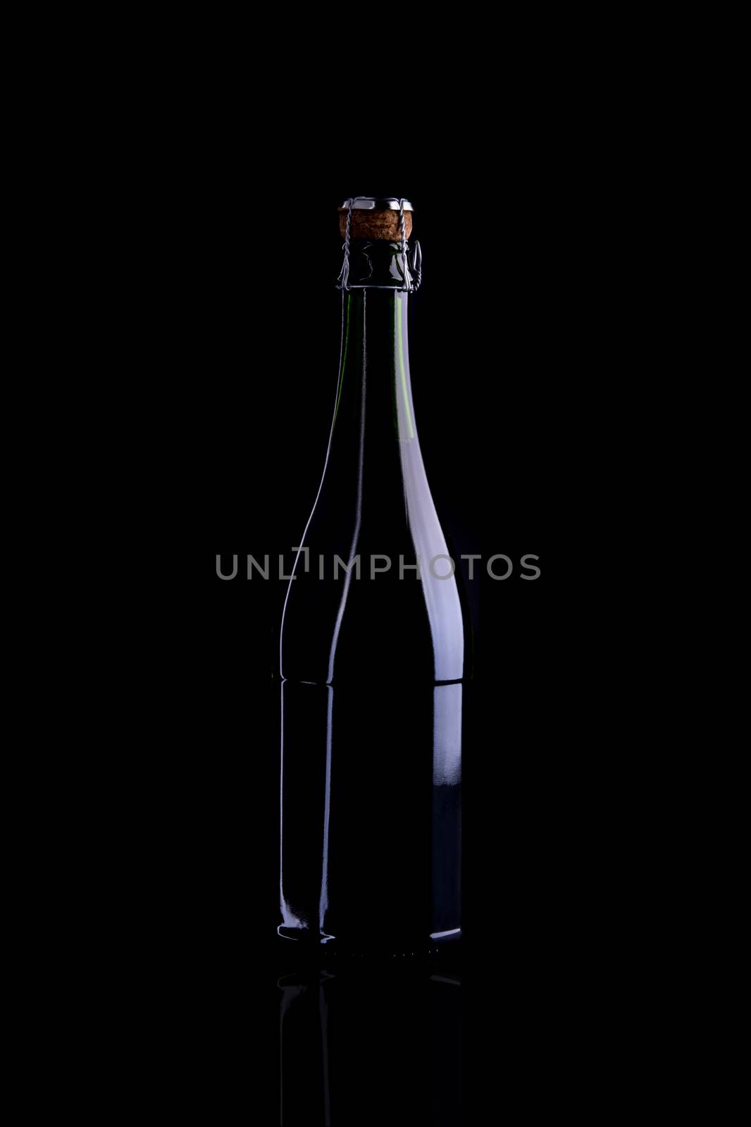 Wine bottle, still life profile, isolated on black background