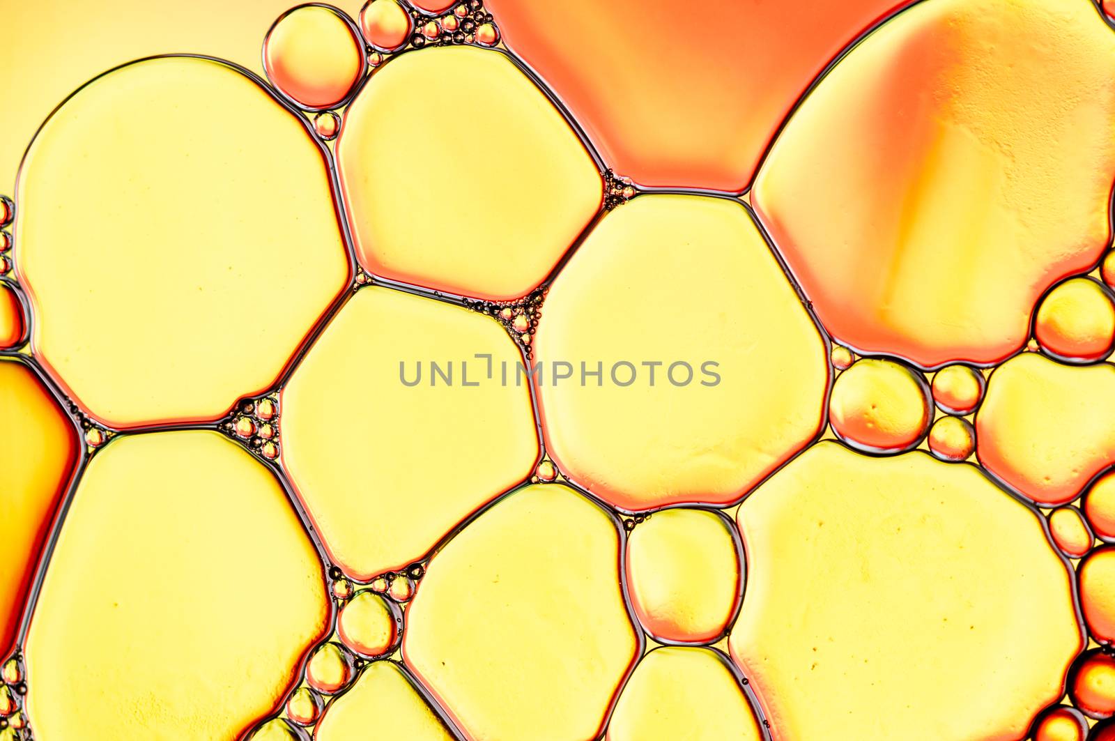 Abstract Colorful reflections on oil and soap bubbles in water