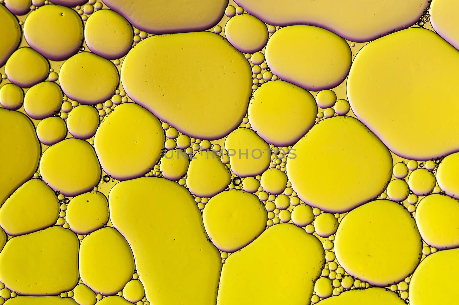 Abstract Colorful reflections on oil and soap bubbles in water