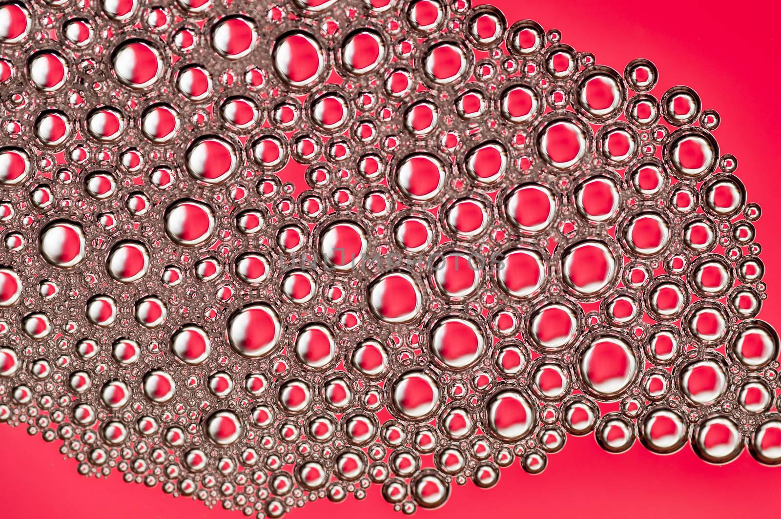Abstract Colorful reflections on oil and soap bubbles in water