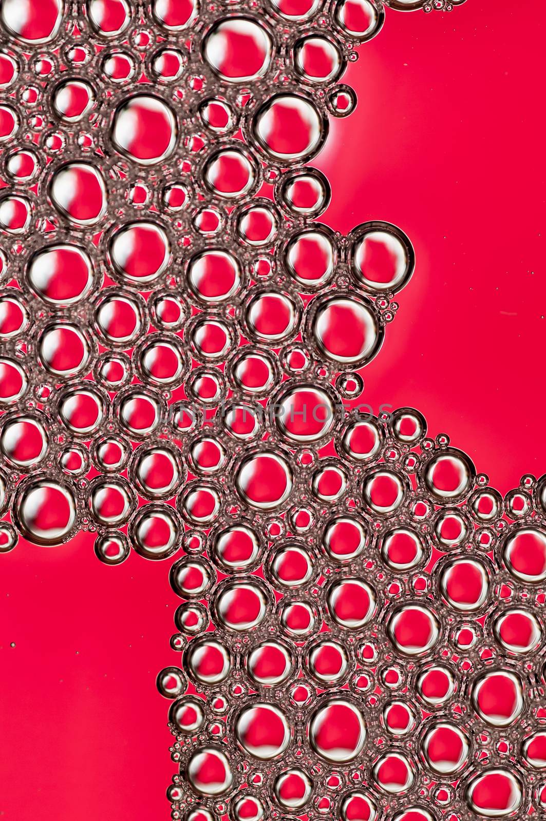 Abstract Colorful reflections on oil and soap bubbles in water