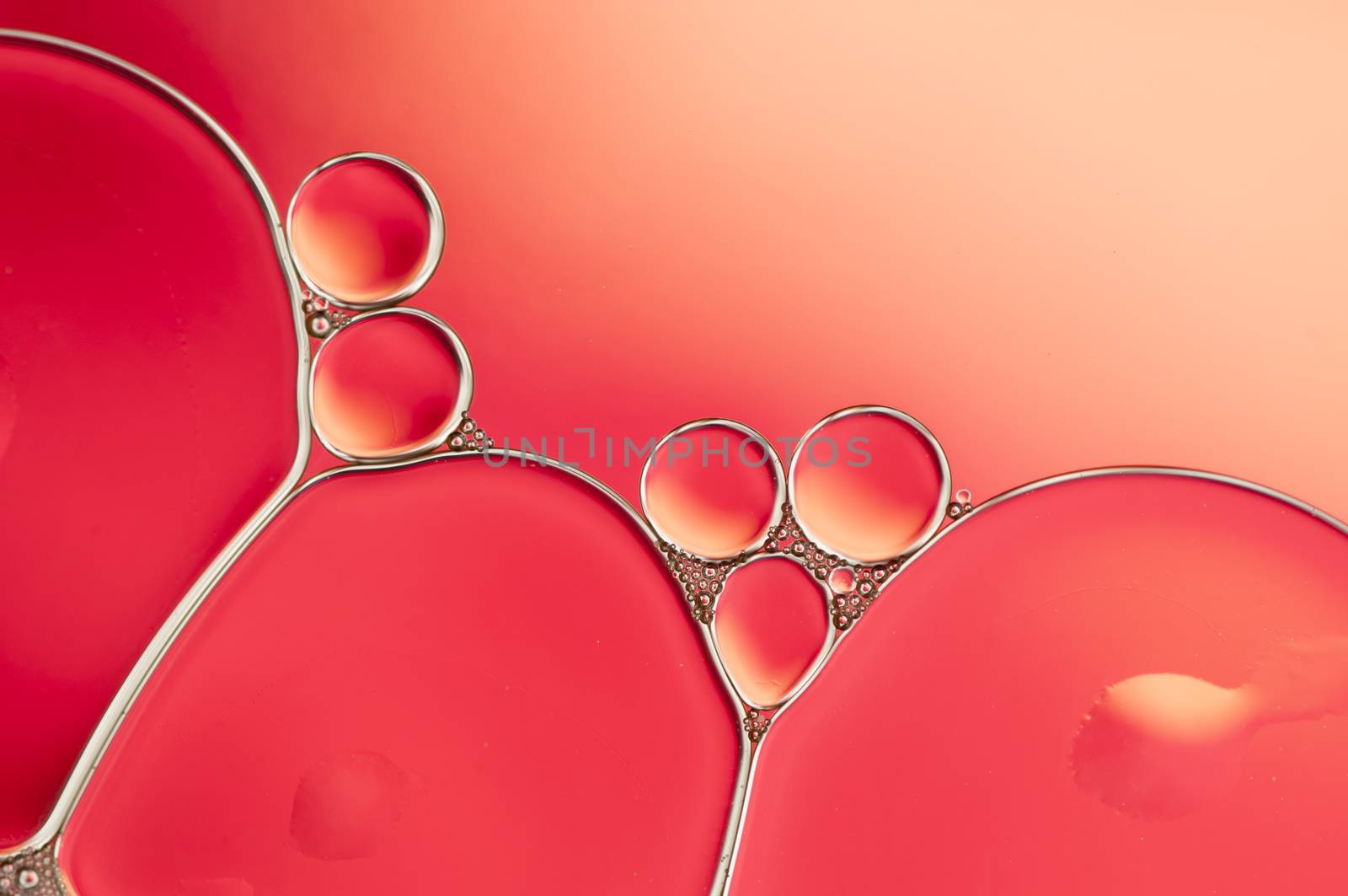 Abstract Colorful reflections on oil and soap bubbles in water