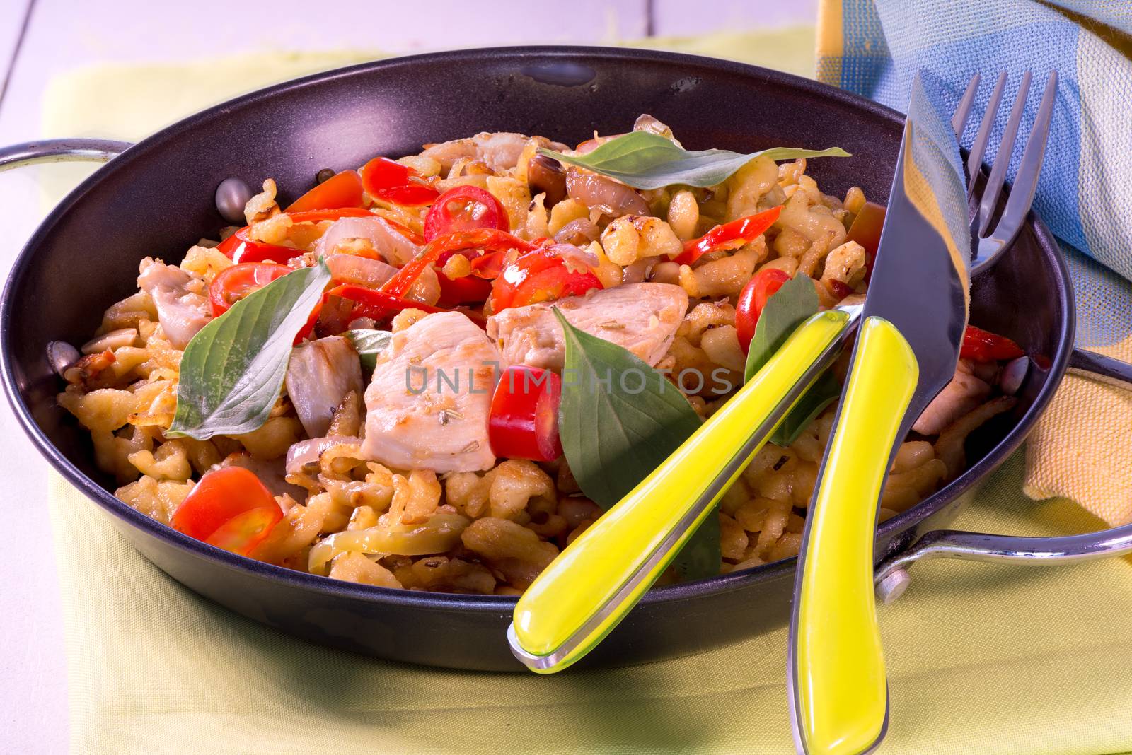 spaetzle noodles served in a black pan