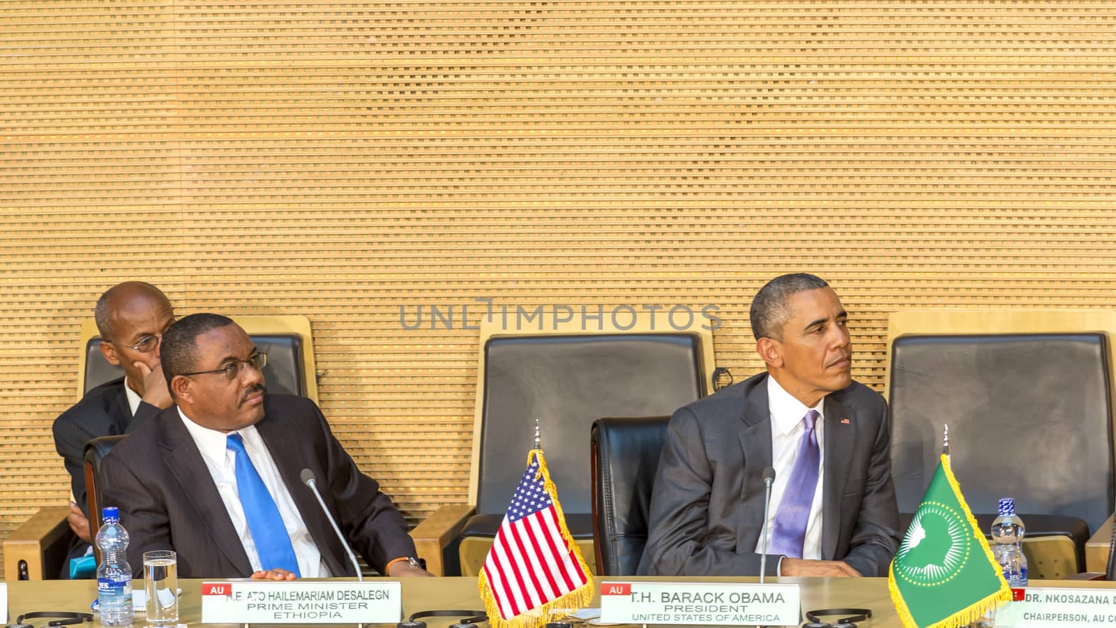 Addis Ababa - July 28: President Obama and Prime Minister Hailemariam Desalegn attentively listen to the speech of H.E. Dr. Dlamini Zuma, Chairperson of the AUC, on July 28, 2015, in Addis Ababa, Ethiopia.