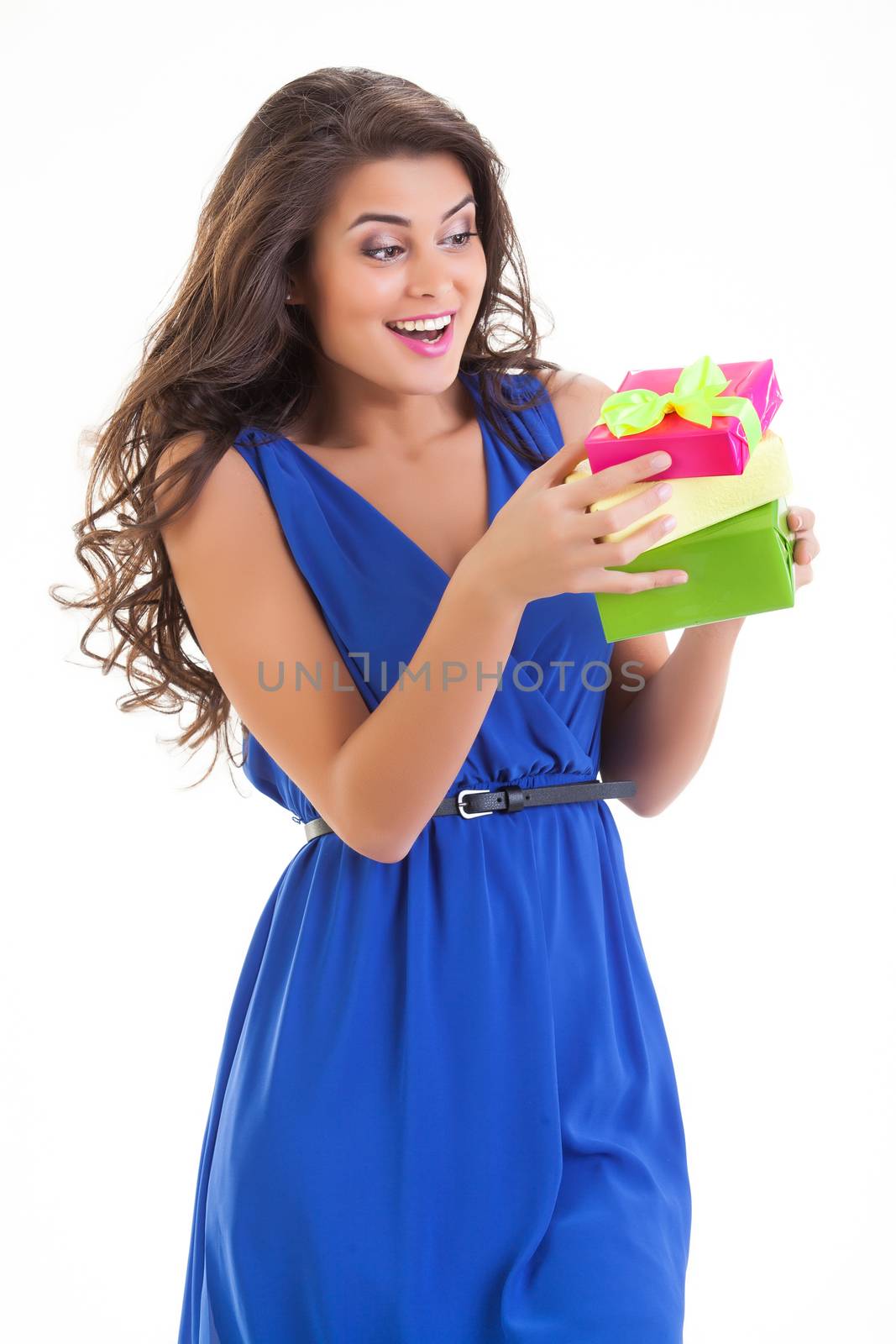 Young beautiful woman with box on isolated studio bakground