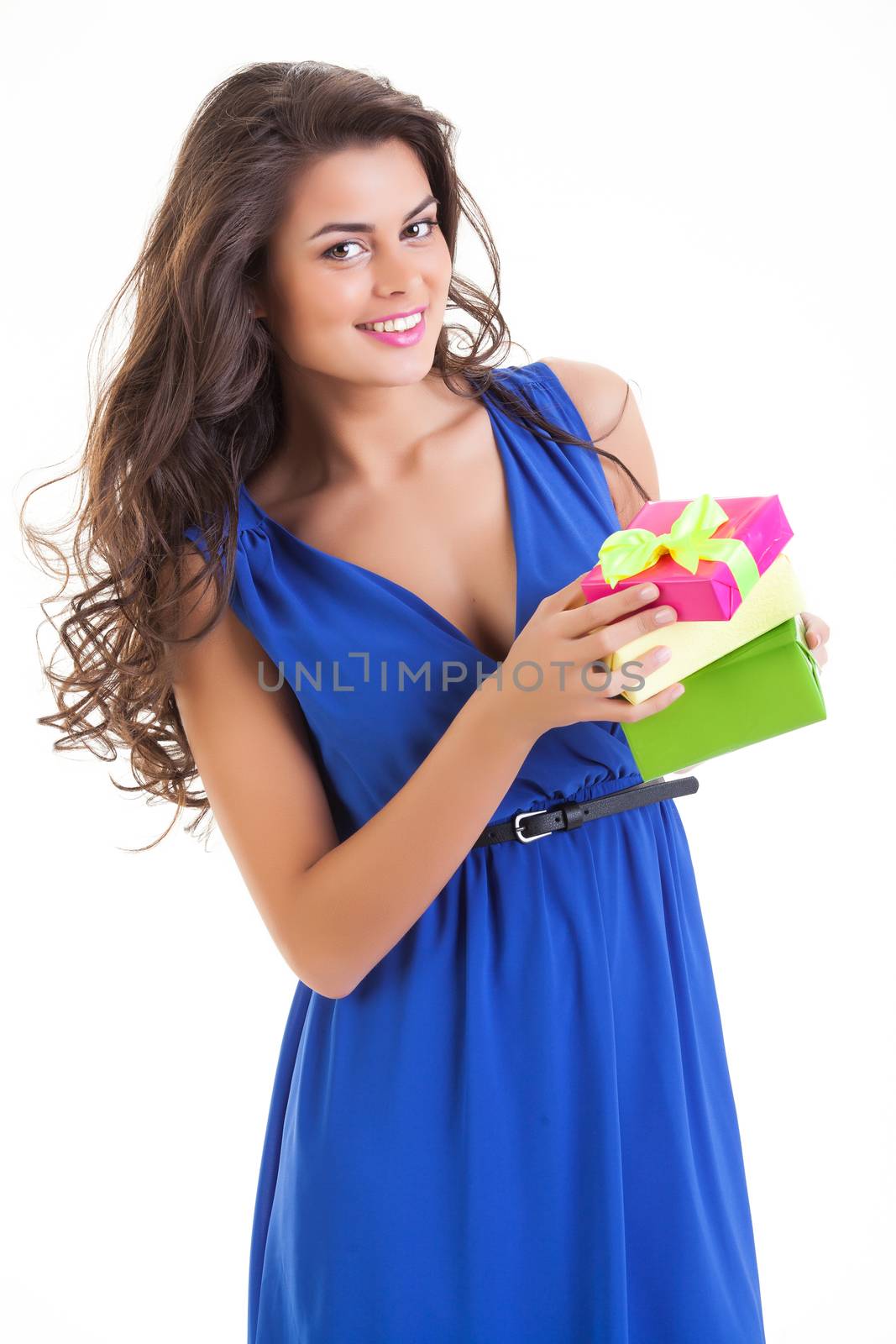 Young beautiful woman with box on isolated studio bakground