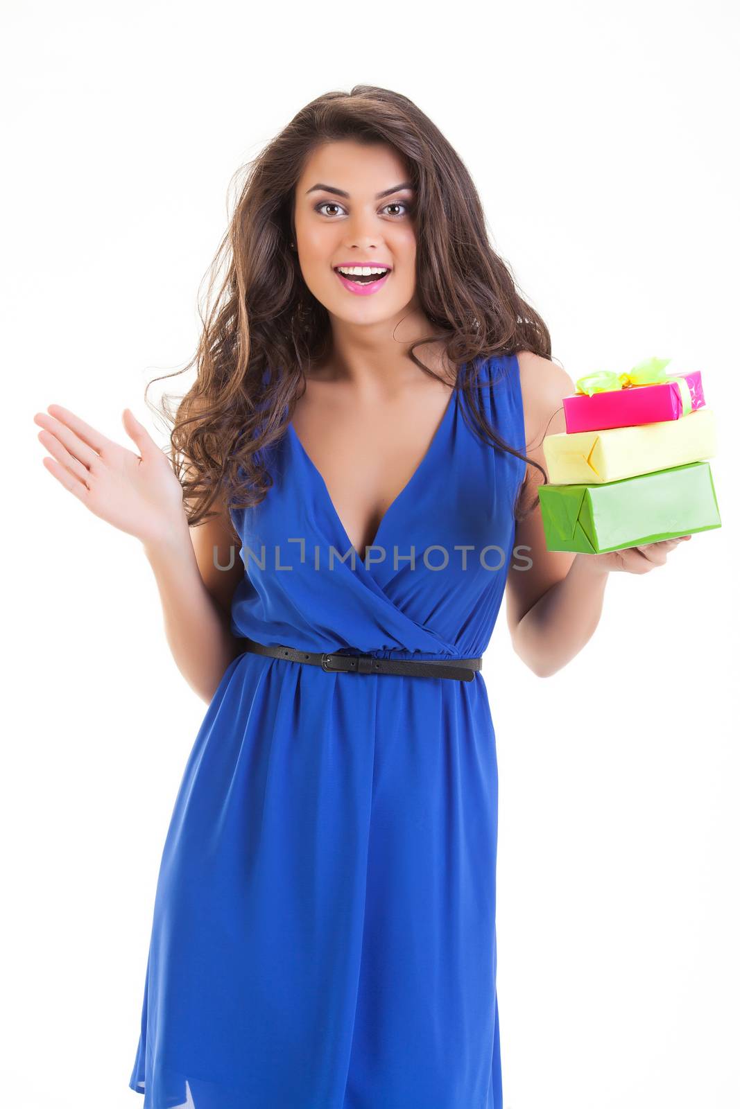 Young beautiful woman with box on isolated studio bakground