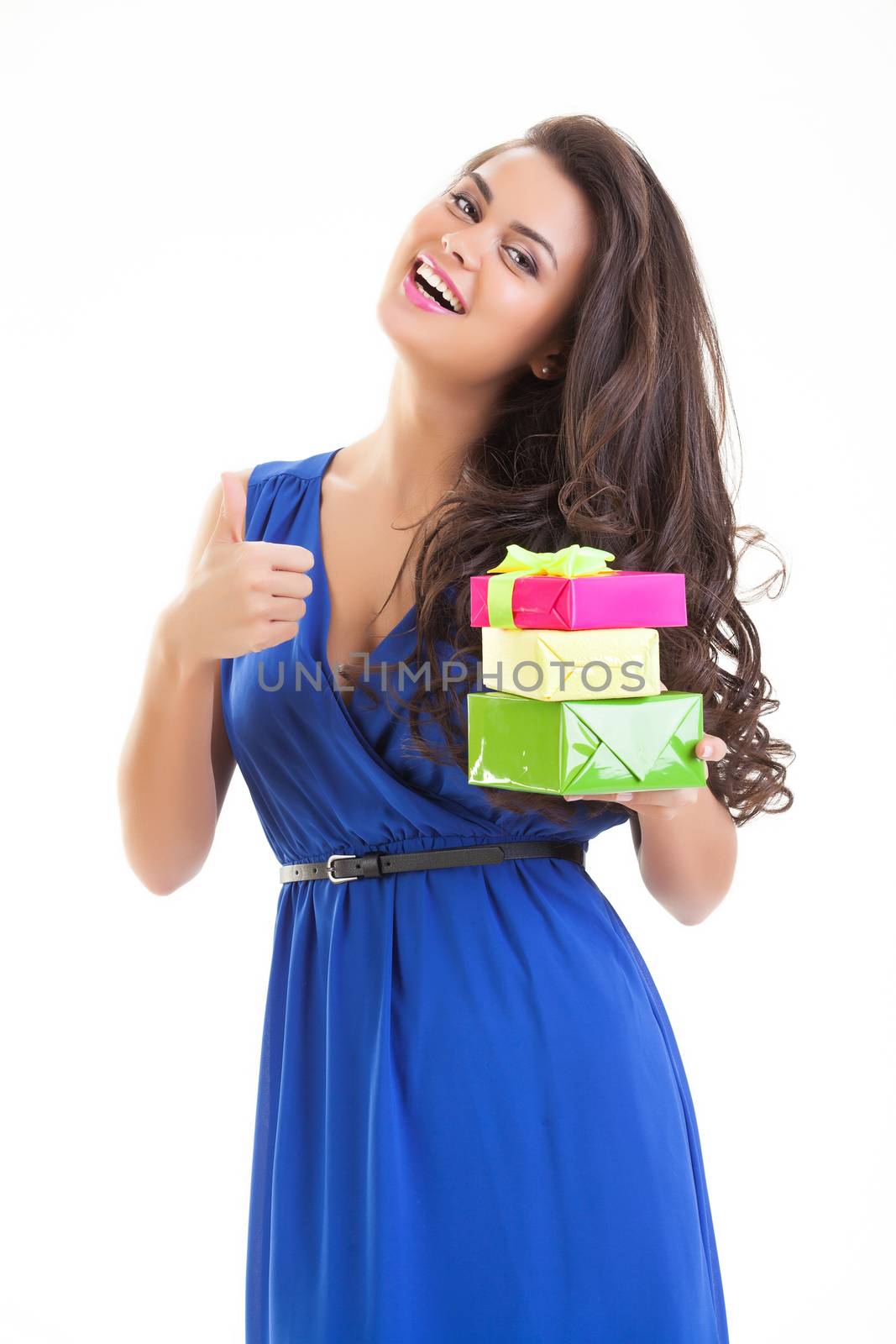 Young beautiful woman with box on isolated studio bakground