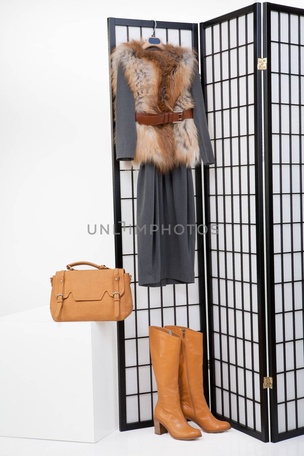 Woman's clothing hanging on the folding screen