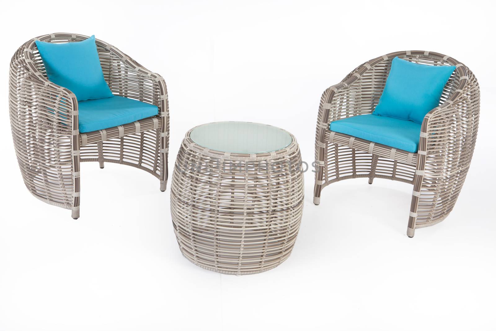 Suite of wicker furniture made of synthetic fibre on isolated background