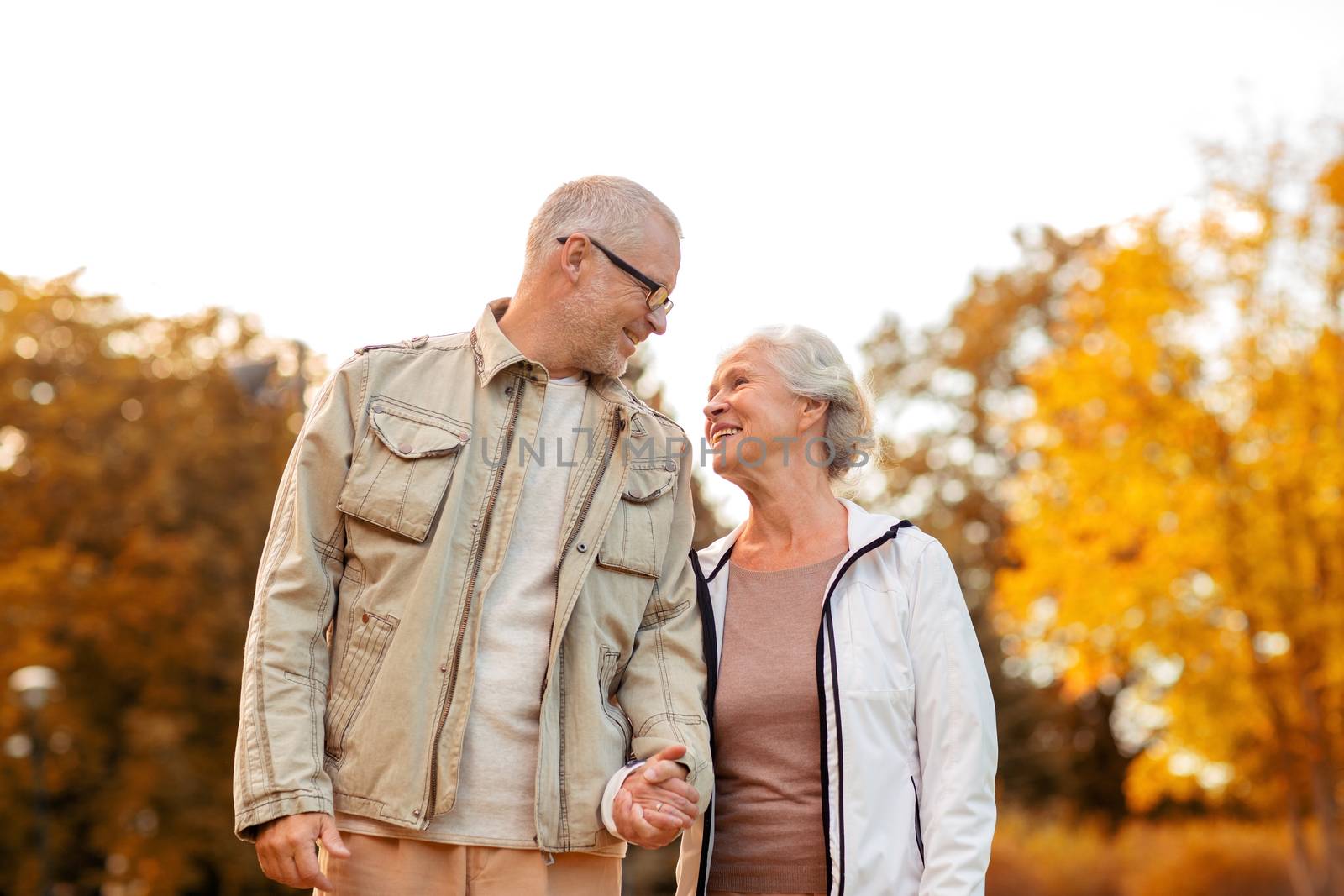 senior couple in park by dolgachov