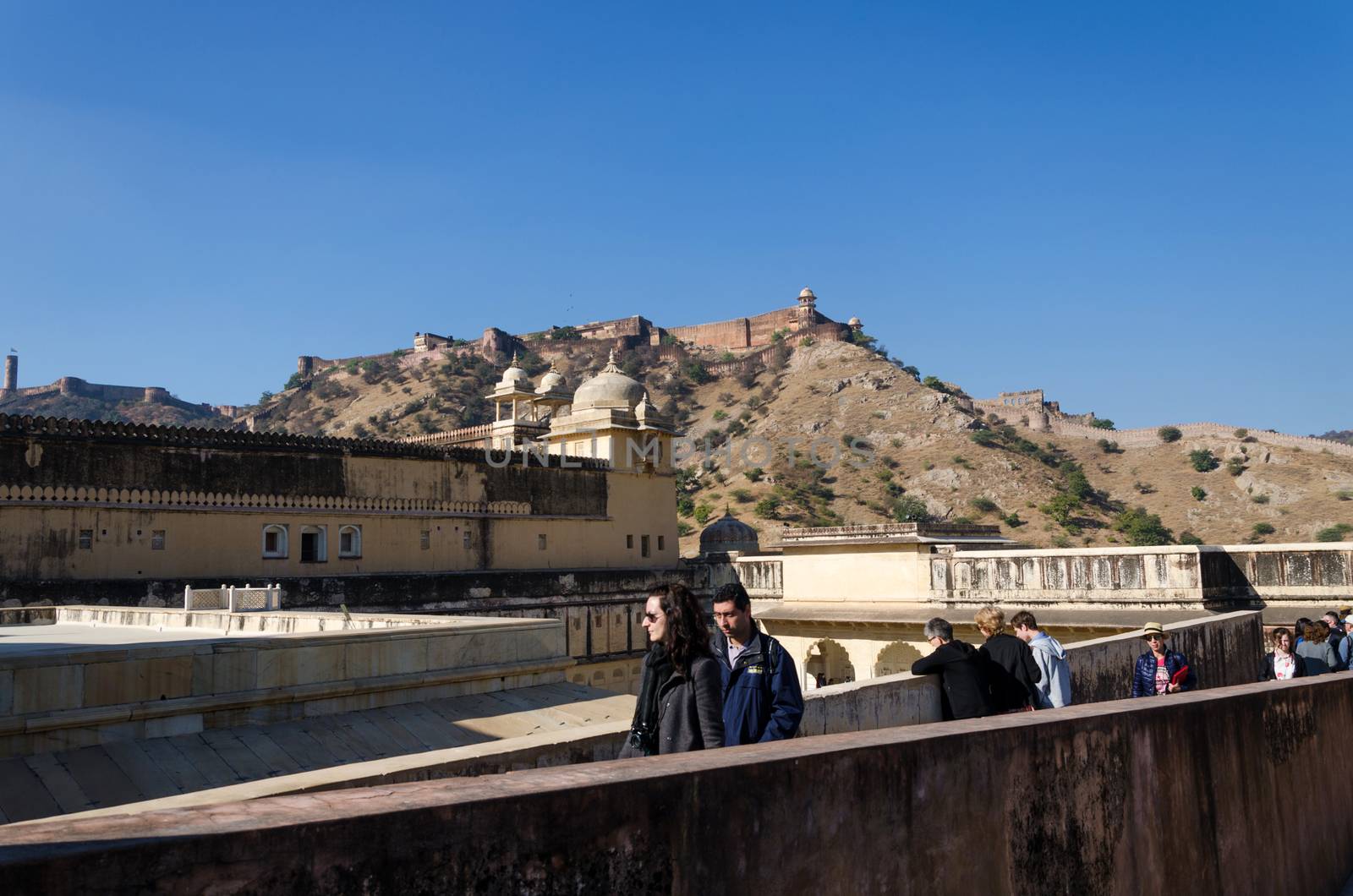 Jaipur, India - December 29, 2014: Tourists visit Amber Fort near Jaipur, Rajasthan, India on December29, 2014. The Fort was built by Raja Man Singh I.