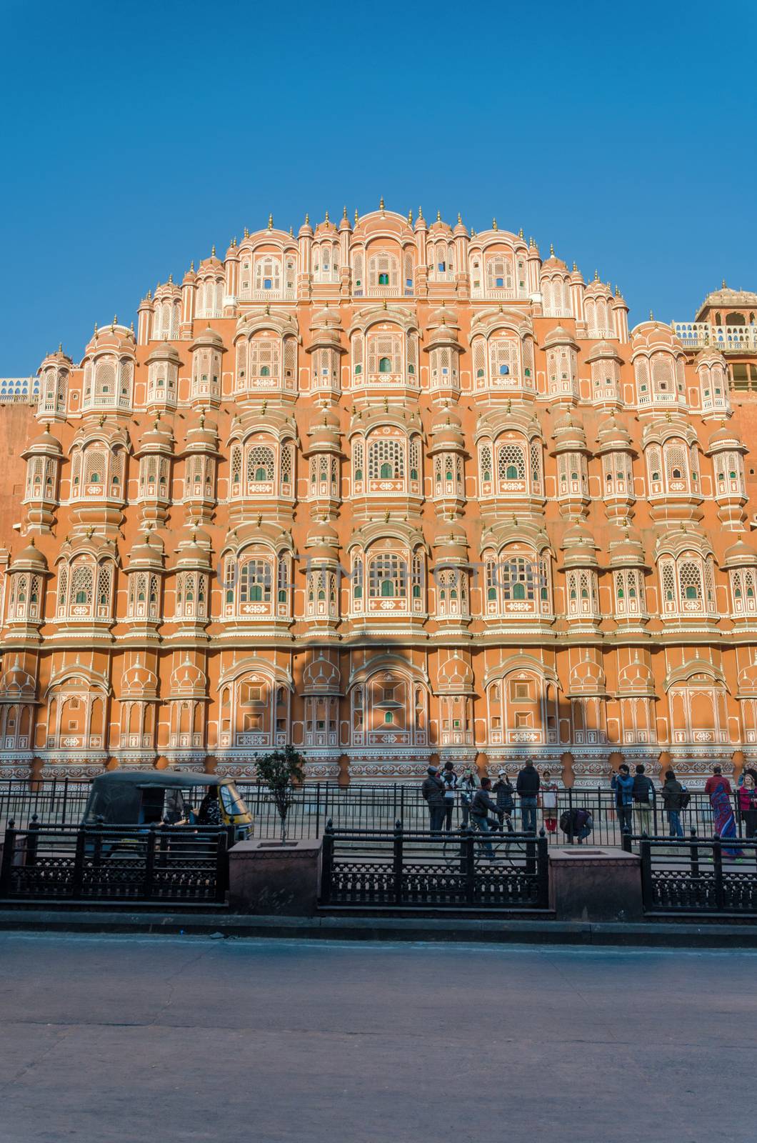 Jaipur, India - December 29, 2014: Unidentified tourists visit Hawa Mahal (Palace of winds), by siraanamwong