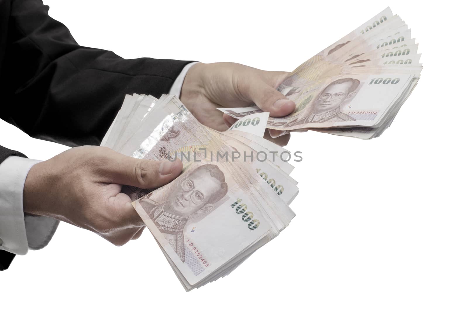 Thai Money in hand, Clipping path included by pixbox77