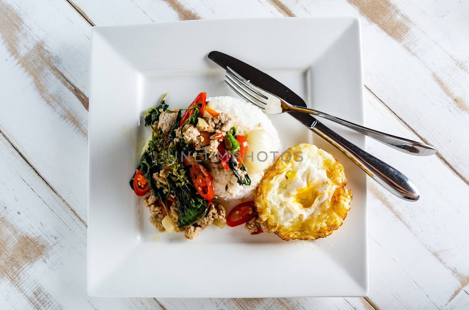 Thai spicy food basil pork fried with rice and fried egg ,Pad Kra Phao moo