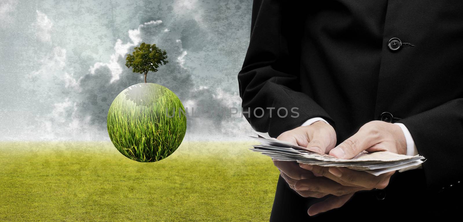 Businessman pay for green business, Sustainable business concept