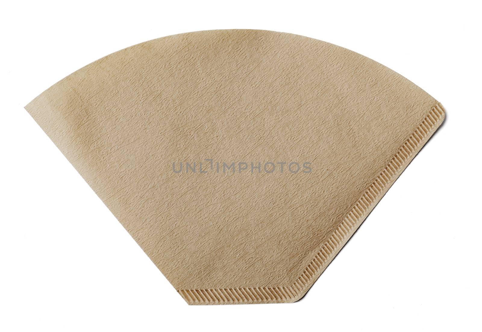 Coffee filter made of paper isolated on white with natural shadow.