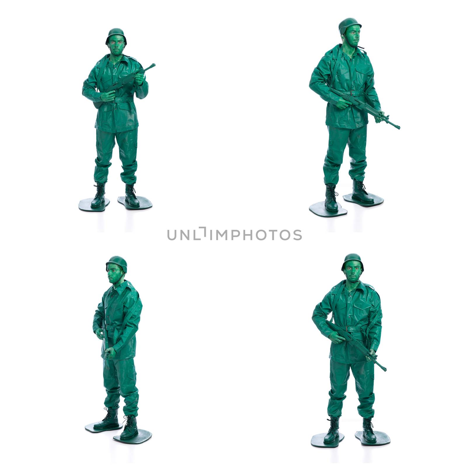 Four man on a green toy soldier costume standing with riffle isolated on white background.