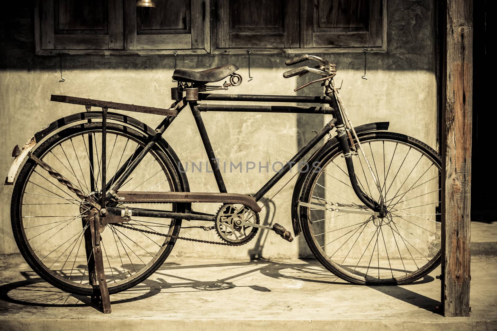 Vintage bicycle parking at old house by pixbox77