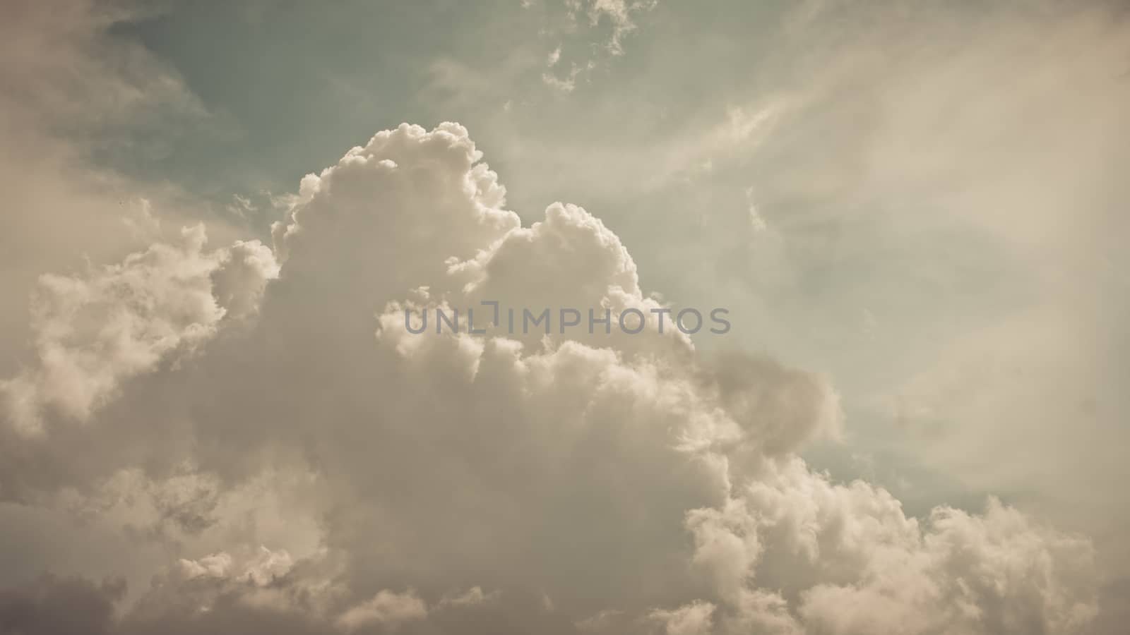 Nice clouds in blue sky in vintage style by pixbox77