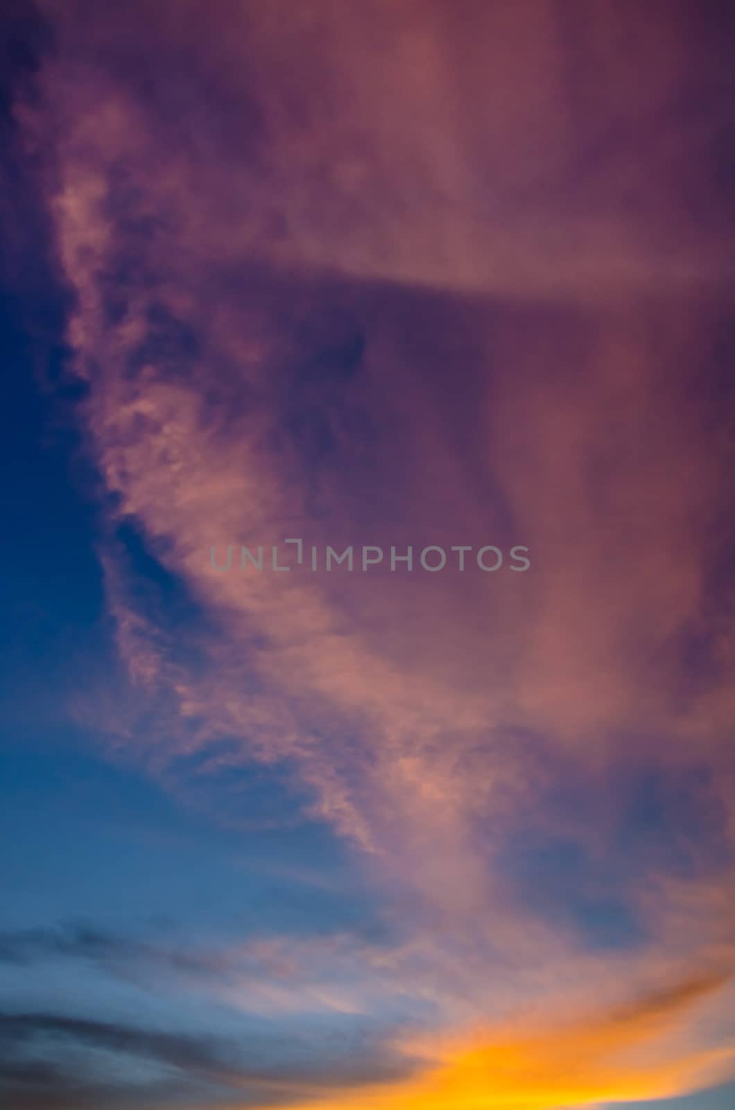 Dramatic clouds with sunset sky by pixbox77