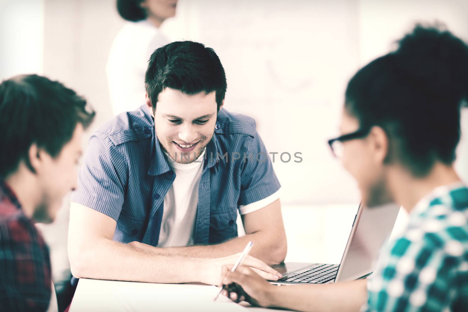 education concept - group of students studying at school