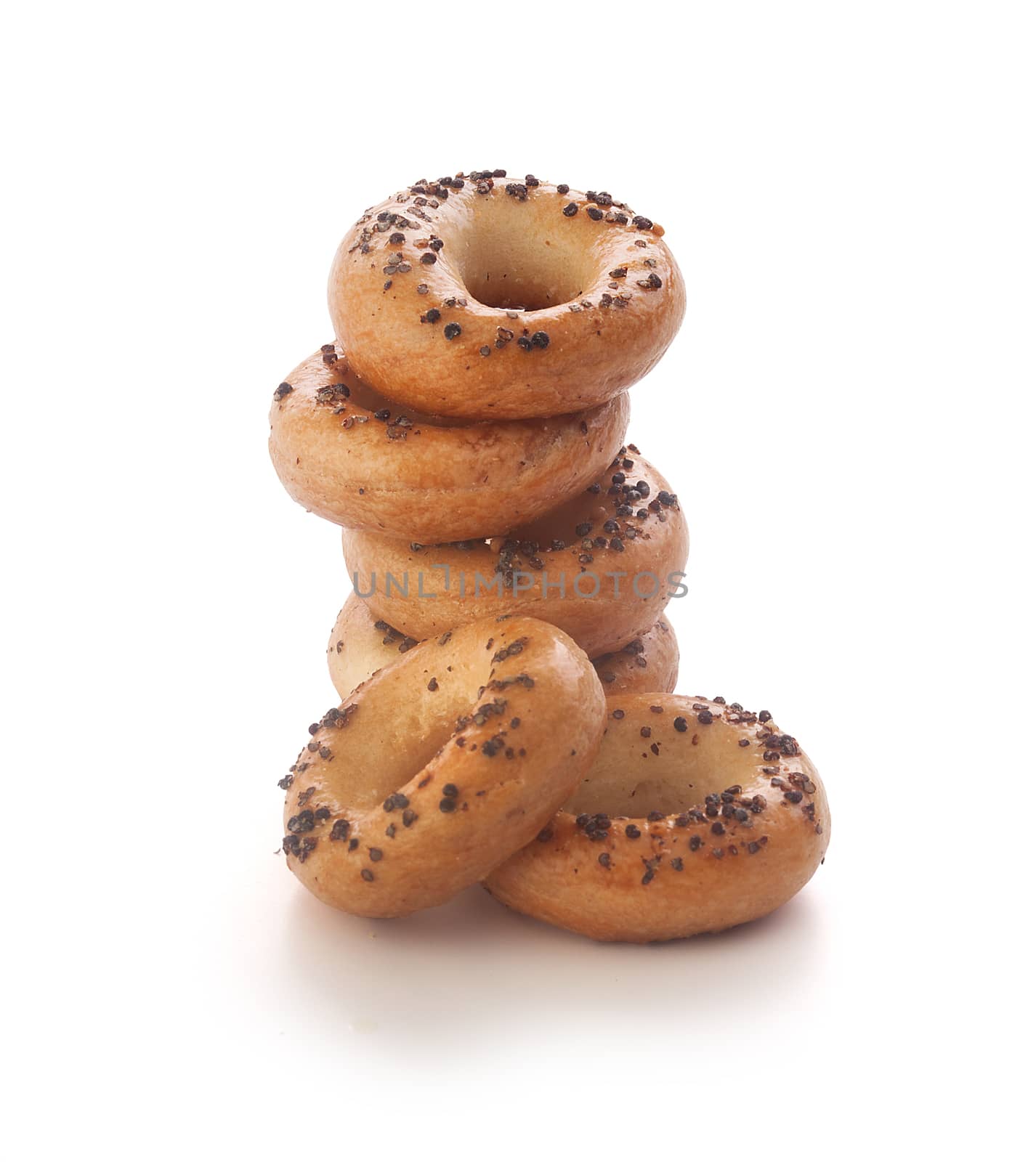 A stack of mini ring-shaped cracknels with poppy on the white background